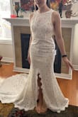 I loved the train on this dress! And the open back. This dress was a favourite of one of my bridesmaids from the ones I tried on. However, I didn't like how flat it made my chest (and a bra would be hard to find), it just felt kind of unflattering. - Mackenzie C.