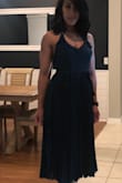 I wanted to love the dress. However; it looks like a long baby doll dress on me. The separation between the top part of the Dress and the bottom looks different from the model. The top part sits to high on my torso not flattering my shape and creating a waste line. I purchased the dress a size small and I felt it was not form fitted enough. The material and color is beautiful, but the top half and middle band needs to come lower. Still debating to keep it. - Emily N.