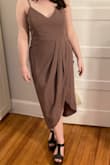 First of all, I LOVED this dress. The fabric is perfect and it's a super flattering cut, and the color is gorgeous (don't pay attention to the color in the photo, it's much more mauve-y purple in real life). I'm usually a medium but decided to get both the medium and the large - the medium was slightly too small and the large was slightly too big! I'm going to keep the large (that's what I have on in the photo) and try to get the top taken in more. A little disappointing to be in between sizes but it's fine because the dress is so cute. - Naomi F.