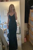 I was debating between the S and XS but I went with the XS and it fit me perfectly! So pretty and perfect for the event I needed it for - would also be great for prom. My only complaint is the buttons on the back because they're really hard to open and close, but not a huge deal! - Alexandra S.