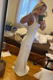 I love love love this dress!! I am using it for my wedding and it's exactly what I was looking for! I did tell the system I didn't want it too tight so it's totally on me but their sizing is very accurate! I am 5'2" and weigh 125/130. The size I got is small and the only reason I want to try an XS is cause I want it to hug my curves more and want it a little tighter. But never the less, Gorgeous dress! - Carissa K.