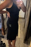 I'm not one to write reviews sooo it's THAT good! I was hesitant on a bodycon dress at first. I still have a little belly after giving birth so I never in a million years would've thought I would love this dress so much. I ordered it to have another option for a wedding. I tried it on and fell in love with it! Fit in ALL the right places. The fabric is a little thicker and the ruching is perfect! I would recommend this dress 100 times over. I'm usually between a medium and large and went with a medium based on other reviews and so glad I did! It's so flattering and it's the perfect length! Buy it! - Emily H.