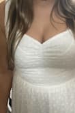 Great fit! Didn't love the ties on the shoulders only because I already have wide shoulders and feel like the bows draw attention. BUT I can tie them lower in the back to hide it and it looks better in my opinion! Perfect for my bridal shower! It flares out comfortably, I only wish it pulled my top half in a bit more around me waist but if you are looking for a comfortable fit, this is perfect. Love it! - Cameryn E.
