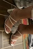 These thin my feet out and are sturdy! Very comfortable, walked around in them all night with no discomfort! Don't mind the unpainted toes.lol - Cameryn E.