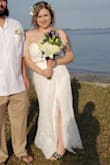 I love this dress!!!! It is elegant and sexy! I read a review that suggested upsizing and that's what I did. I ordered XL and it was a perfect fit. I added a bridal belt and it elevated the dress to a whole new level. - Alyssa C.