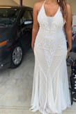 This dress was perfect for my beach wedding! Everyone complimented me on it they loved the detailing! I felt beautiful. I loved how it hugged my curves! it was very comfortable as well! I highly recommend this dress! - Pavielle W.