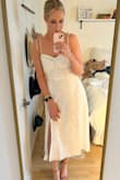Will be wearing this to my rehearsal dinner. Runs true to size and has some space to move! The material is beautiful and feels more expensive than it is. Not size though at all as long as you're wearing nude undergarments. - Jessica H.