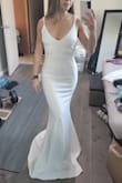 Gorgeous, absolutely stunning. I was so pleasantly surprised at how luxurious and thick the material was! I ultimately returned it because it was a little too low cut for me but it was exceptionally crafted and I would recommend if you don't mind low cut or if you are going for a sexier look. - Amanda R.