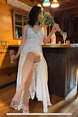 I chose this dress for my elopement this year after reading many reviews. The dress is very sexy yet still safe from exposure as it has [a] bodysuit under [it]. The material is quality and thick enough. It is beautiful in the picture and comfortable to wear. I just have to adjust the boobs area to hide my tattoo and hem it a bit for my 3" heels. - Thuyen T.