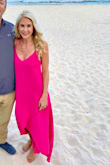 This dress was absolutely stunning for our beach vacation. Medium weight material, flowing and received lots of compliments. Buy the dress! - Karrie K.