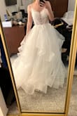 I thought this dress would be soft, fluffy, and airy for some reason, but when it arrived it literally stood up on its own haha! It has a lot of tulle and crinoline that was just too poofy, scratchy, and uncomfortable for me. I also didn't like how the boob cups stood out super stark and were very obvious, all I could see when I tried it on were the two white boob cups. With that said, I did like the silhouette of the top part, I think the top/neckline is flattering in its shape and it fit pretty well size-wise (would need a bit of tailoring), but overall, not the right dress for me. I love Lulus and their customer service is AMAZING, but this one went back right away! - Cecelia S.