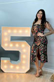 Super cute dress and got so many compliments!
It's a very form-fitting dress with no give since the material is nonstretch. I feel like a medium would've been too big. The small was great just a tad tight on the hips and midsection. - Clarissa R.