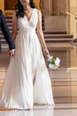 I wore this dress for my city hall elopement and I loved it- it looked beautiful when it flowed in the wind and it was very comfortable! I have a pretty small chest and when I bought this dress in size medium it was super baggy in the armpit area, so I exchanged it for a size small and it was a perfect fit. - Jessica C.