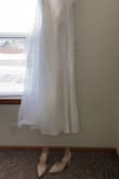 Little too long for me Even with my 4''heels but a little hem will fix :) it's heavy material! It's going to be perfect for my special day. - Jessica L.