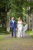 I bought this dress 2 days before my wedding. When it arrived, I tried it on immediately and fell in love! It accentuated everything beautifully. It even held up to the Florida heat in the middle of July. I am so happy I changed my mind at the last minute. This dress is my absolute favorite. - Natalie M.