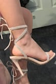 Fit true to size and very cute, but as someone who is not usually bothered by heels, these were the most painful pair of shoes I've ever worn. Wrap-around straps also fell down constantly, even when tied painfully tight, making it hard to walk. - Madeleine J.