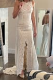 I ordered multiple Lulu's dresses to try on for my wedding. This one didn't win, but it was a stunner! The back is to-die-for. However, if you have a small chest, the front doesn't do much for ya. Also, fyi the train is very long. Altogether a gorgeous dress, just not my favorite. - Ashley P.