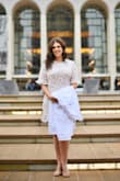 This dress was so nice on! Fit nice around hips; length was great. Wore it for my white coat ceremony and received lots of compliments :) - Pardis S.