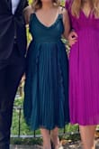 Beautiful dress made from incredible material, feels great on, and seems like it's built to last! Wore it to a wedding and got lots of compliments :) - Ella C.