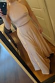 The set is really pretty, the top part is a bit loose (I have a short torso, so the straps are long for me). The waist is also a bit loose. But I think I will just do some alterations so it fits better. The color is more of a pinkish color rather than champagne. The quality of the fabric is amazing, has really nice material, and is not see-through at all. - Lucia C.