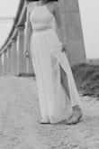I bought it to my engagement photos and it was so beautiful!
It was little long (I'm 168 cm) so I had to shorten it.  
Be aware that the the top of the skirt has a lot of folds so its makes you wider but with the total look its amazing!!! - Paz R.