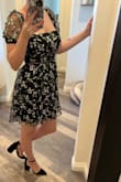 This dress is very cute. Good length - not too short. Wish the sleeves had a little more stretch at the bottoms. Overall would buy again! - Melanie B.