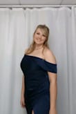 I love this dress! I did the sizing test and it recommended an XL and that is the size that fit. It was perfect and I have no complaints. - Delaney W.