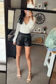 I have this in 2 colors now! Adorable and doesn't shrink so much like other bodysuits do! Coming from a taller girl, it fits my long torso well! - Jae T.