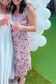 Such a romantic dress. Wore it for a bridal shower with no bra because the material is thick enough and supported me well. Comfortable dress!! Adjustable straps into a bow. Now I want it in the dark color! - Jessica B.