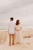 The shoulder straps were slightly long but my mum is a seamstress so that was an easy fix to make it shorter since I don't have much chest to fill in the top. The material is great & dainty! Loved it for engagement pics! - Emma A.