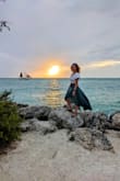 True to size. Flowy, feminine skirt. Material is soft and feels good against the skin. Was able to wear with flat sandals and it didn't drag. Wrinkles easily but those fell right out with just handing in the bathroom during a shower. - Audrey B.