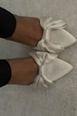 Great fit, came in packaged with care. Shade is a little darker than my ivory dress but I still love the fit and style. Fits wide feet as well, I did not need to size up. - Sherry M.