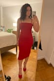 I bought and wore this dress for NYE and it was a hit. It fits so well. Was snug in all the right places and really shows off the curves, while still being stretchy but not constricting. I love the slit along the leg - it elevated the dress from a body con midi dress to something more. I received so many compliments on it. I want to purposely find other occasions to wear it to! I bought the Laura Red Suede Ankle Strap Heels from Lulus and it went perfectly with the dress. I can't wait to wear this dress again. - Katelyn Z.