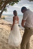 I bought this outfit for a beach wedding and it was perfect for the theme ! It does run a little large and is very long. I am pretty tall and it still dragged alot on the floor. - Dakota T.