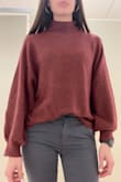 Love this sweater! The material is very soft and cozy feelings, with a unique color. I love the thick mock turtleneck and sleeve cuffs. It can be dressed up or down, but definitely leans more toward a comfy look. It's extremely oversized, so I would size it down. I am a typical small and ordered the XS - it's still huge. Not a critique, just a note for sizing. I love the look on this top! - Tori R.