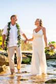 I absolutely loved my wedding dress! It fit perfectly, wasn't too heavy or tight, great quality and absolutely stunning beadwork. I got married on a beach and got in the water for pictures. The dress was full of sand when I took it off.
Hung it up outside to dry and the next morning we shook it out and it looked perfect! Love love love it! - Lori O.