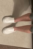 These sneakers are super comfortable from the moment I put them on. I usually wear sizes 6.5 or 7, and the 6.5 fits perfectly. They feel like sponges on my feet. I bought these to wear to the after-party at my wedding. The platform gives it just enough boost. I love them! - Marie J.