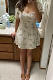 I bought this dress as a casual look for my engagement photos & am in love! It was a little wrinkled out of the box but with an easy steam I know it's going to be exactly what I wanted. It's off-white making it a beautiful soft spring dress. I can't wait for warmer weather to wear this out. - Jillian B.