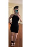 This is a really nice dress. Its just super tight on me. Since I don't have a large chest there is some extra fabric in the boob area, but I couldn't size down because the dress fits everywhere else. - Katelynn M.