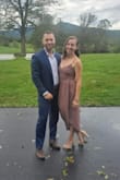 I ordered a size small and have a smaller bust, it was tight and I couldn't wear a bra with it but overall I loved it and got a lot of compliments. It was rather windy when I wore it for a wedding and the slit got questionable at times but it was fine. - Megan C.