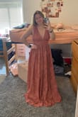 I was so excited about this dress, but it is huge on me. There is a lot of fabric so it feels like it weighed me down a bit. I think if I had a darker skin tone, I would look a little better, I think it just washed me out. I returned this dress, but am not planning to order it in a different size because it was not flattering on me. - Jade R.