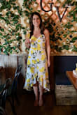 Wore this dress at my bridal shower, so cute! Ended up wearing an XS because it fit better in hips, but was definitely a bit tight around the chest. I'm a B cup for reference. - Kristen M.
