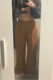 I kept trying these on hoping I would like them. They looked so good in the photos. The waist (13") was too small and the pants too wide/baggy, plus the fabric is too thin and of poor quality so the pants just hang on me. They are also too long and I don't trust that this material is easy to hem. - Alexandra B.