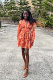 I wore this dress to a wedding rehearsal dinner in Hawaii. I received many compliments on both the dress's color and pattern. I'm thin with a small chest, so I was initially worried about the neckline, but I think it worked well. If you have a smaller chest like me, I think you could get away with just pasties underneath. I had no problems with the length of this dress and look forward to wearing it again. - Kaitlyn W.