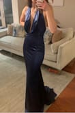 Needed to hem the train and tape the busty area, got so many compliments about the plunge area. - Jacquelyn C.
