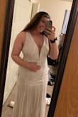 This dress is absolutely stunning in person, the sequins detail is even more beautiful in person. I personally didn't like the fit on me as it made me look a little boxy and was shorter then I was hoping for. I would definitely recommend this dress even tho I didn't keep it. It's simply timeless. But keep in mind if your on the taller side it's probably not the one for you, especially if you're not wearing flats. - McKenzie E.