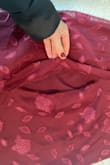 The outer layer of the dress ripped about 12 inches just trying it on. Such a disappointment, because its such a beautiful dress. Never got to wear it to the event it was purchased for. - Lindsay H.