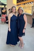 Loved this dress! It"s pretty long and I had to get it hemmed about 2 inches. I am 5'5" and had 4-inch heels on, and it was still too long. The fabric is very nice, the high neckline is flattering, and the back lace-up was a classy way to show some skin. Please note that you cannot wear a normal bra with it. Highly recommend! - Talia V.