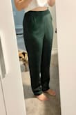 The material does not give any shape to these trousers. They just hang on me. The crotch seam is also very long and is the pant leg for me. The color is nice. - Alexandra B.