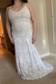This dress has a beautiful train, but the front was longer than I expected (as a short person, I would have needed very tall heels and some strategic tailoring to make sure I wouldn't trip). I tried on various Lulus dresses for my wedding and this one just wasn't the one I felt prettiest in, so I wanted to share photos to help others who may have similar body shapes! In general though it is a beautiful dress. - Vanessa F.